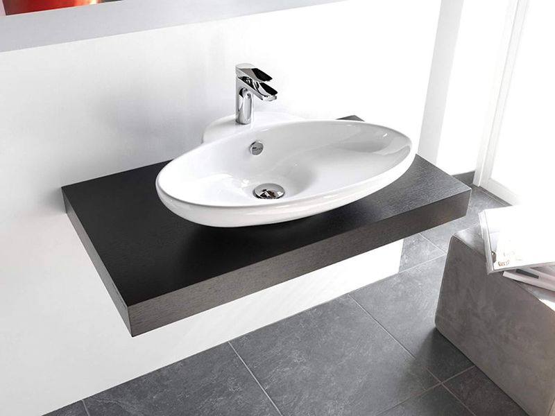 Раковина накладная Artceram Washbasins Fuori TFL004 01 00 bi*1 63х47