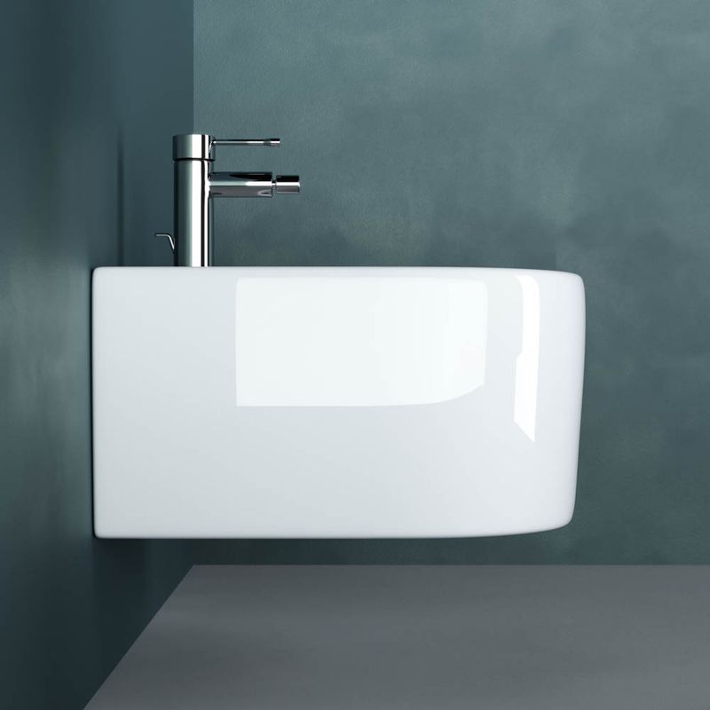 Биде подвесное Ceramica Nova Moments CN3004 49х37 с креплением и донным клапаном с керамической накладкой (белый)