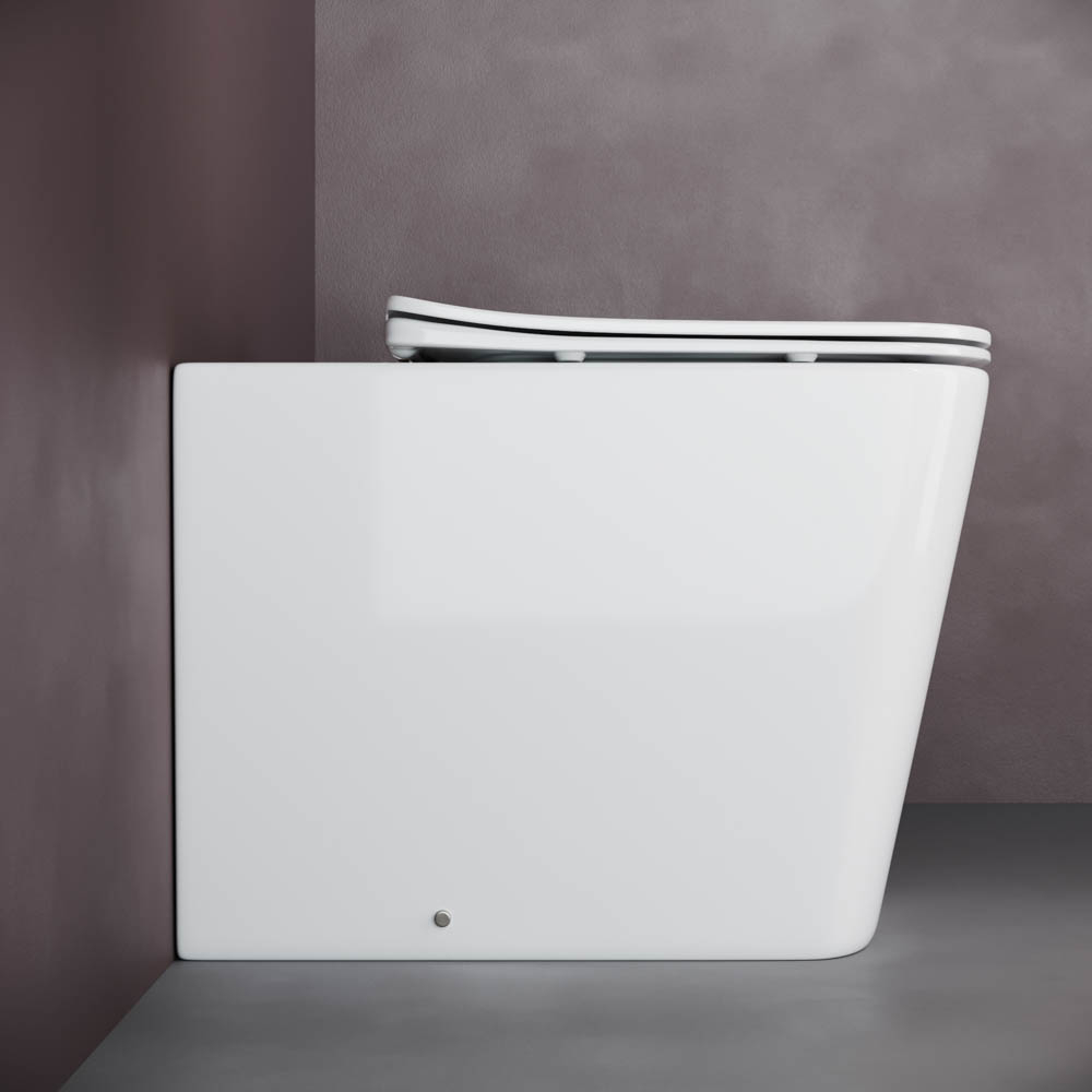 Унитаз напольный Ceramica Nova Cubic Rimless CN1809 52х34.5 с сиденьем и креплением (белый)